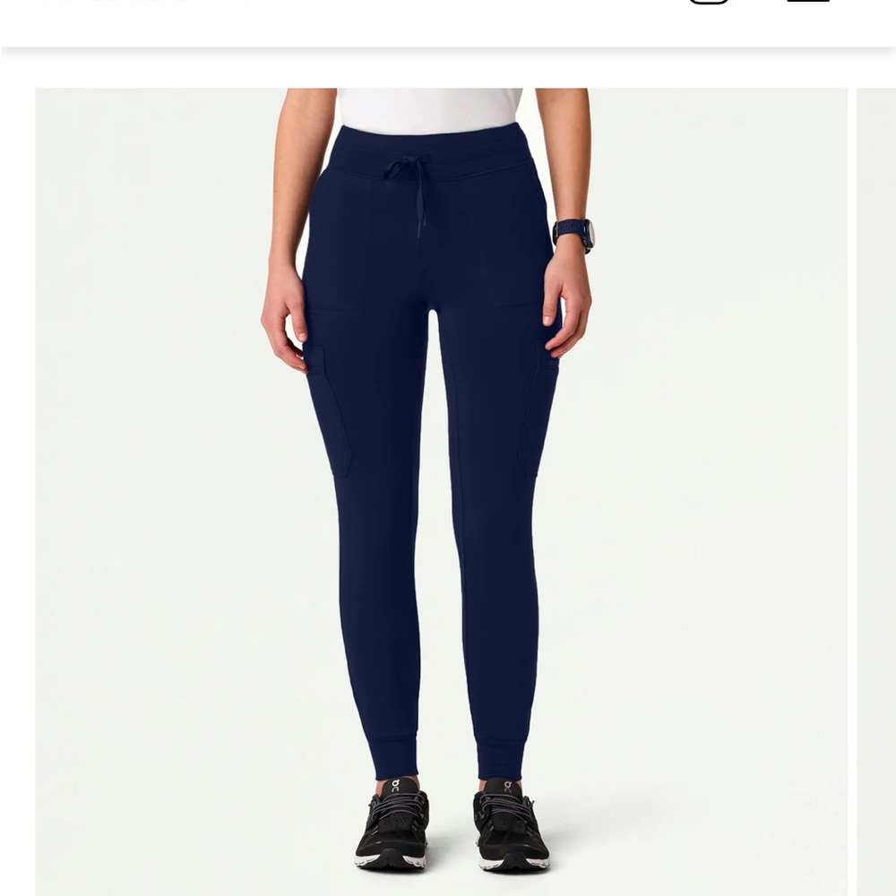 Brand new never worn Jaanuu navy scrub leggings